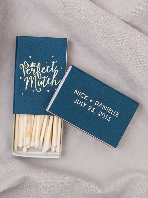 'The Perfect Match' matchbox wedding favours personalised with the couple's names and wedding date | Bradley James Photography