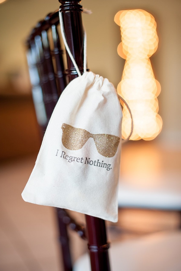Funny 'I Regret Nothing' hangover kit wedding favor for guests with gold glitter sunglasses motif | KMH Photography via Chic Vintage Brides