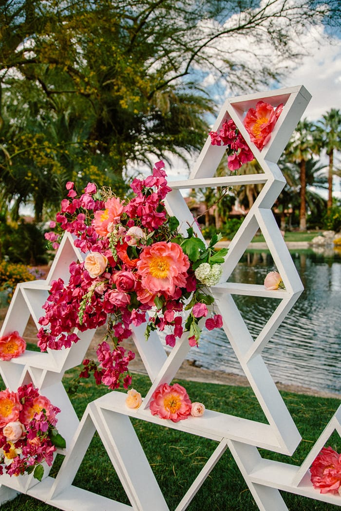 Vibrant Pink & Orange Wedding Inspiration | Ceremony Setting: The Melideos via Ruffled