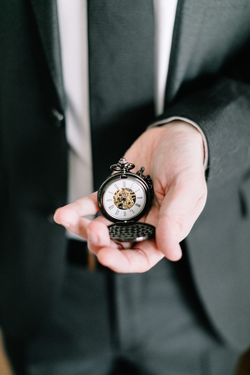 Vintage inspired pewter pocket watch with gold visible movement as a wedding keepsake for the groom | Nattnee Photography